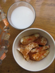 white peach with cinnamon, glass of rice milk