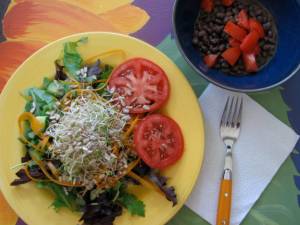 a great salad which we topped with homemade thousand island, and a side of cumin & nooch black beans with fresh tomato